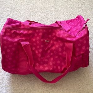 Pink polka dot duffle bag about 16” x 10” x10”